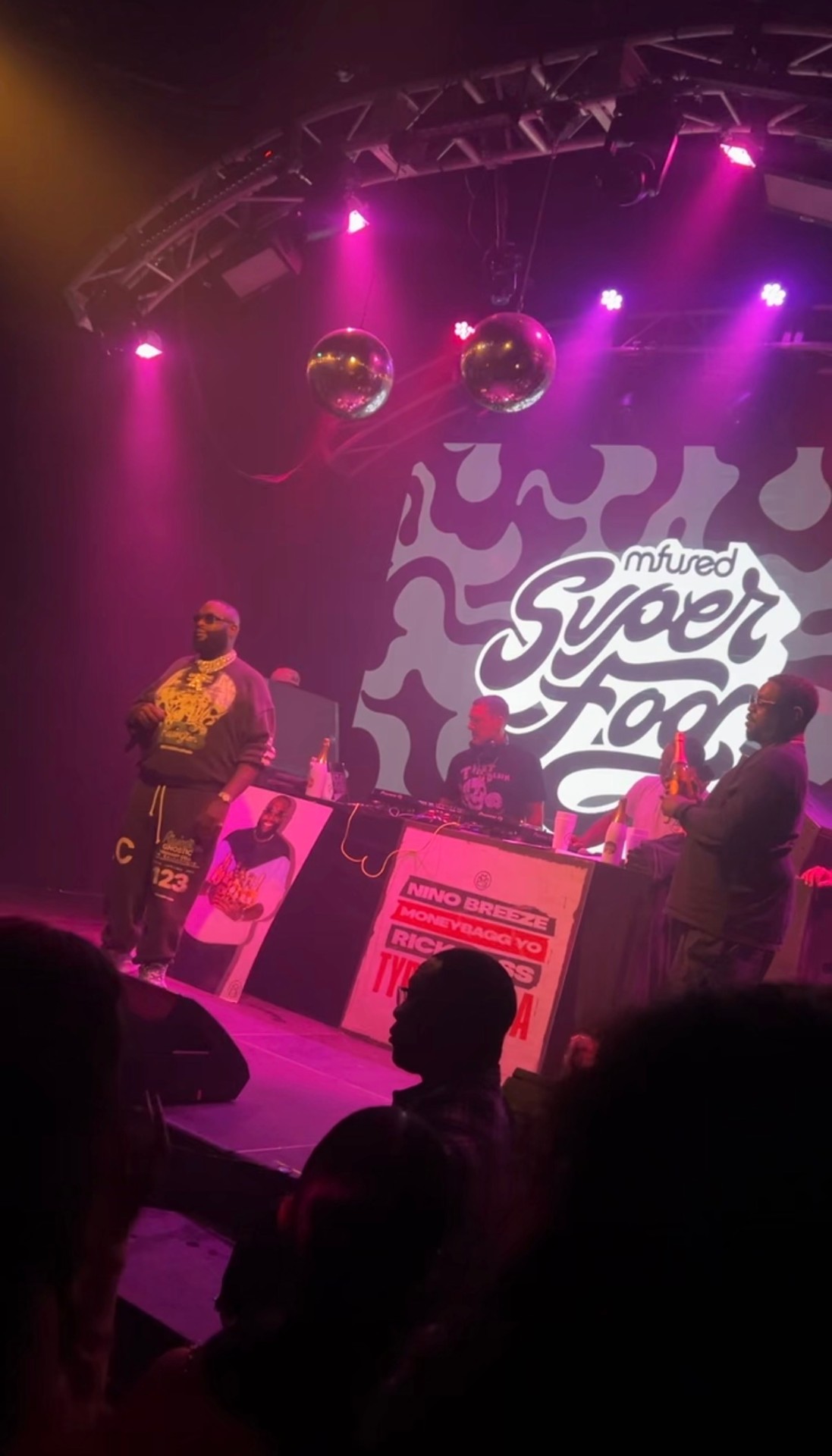 Headline artist performing on stage at a brand activation