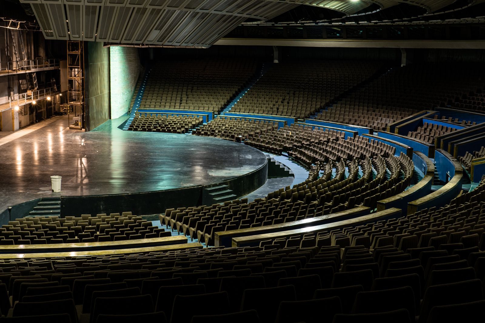 Empty concert arena with the stage lit before doors open